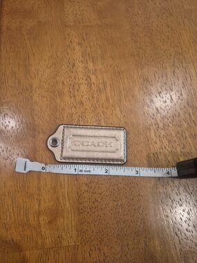 Coach Metallic Rose Gold Leather Bag Tag